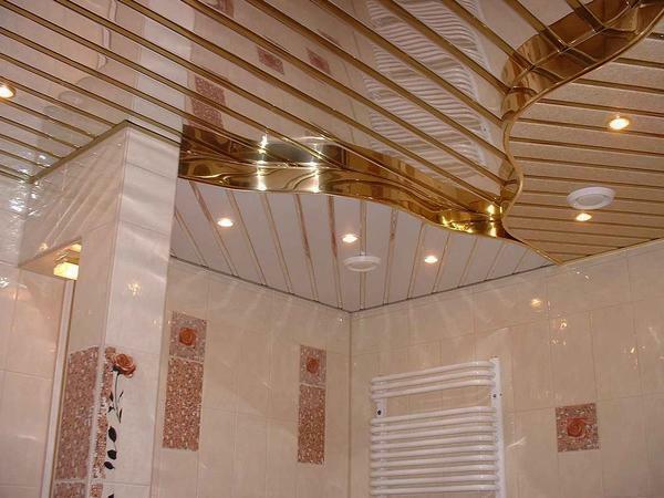 Behind the ceiling of plastic siding is easy to care for, so it is often used in the bathroom