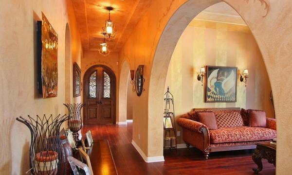 Entrance to the room can be done in the form of an arch or by installing a beautiful sliding door