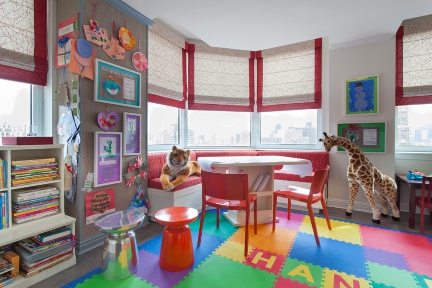 Soft floor in the playroom decorated with tiles of different sizes