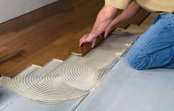 Laying boards on glue