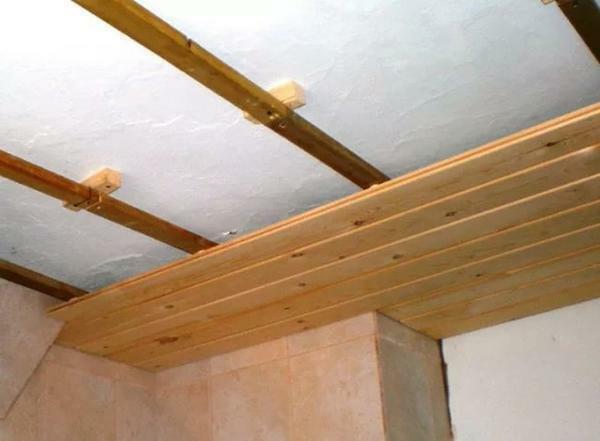 For covering the ceiling, plastic or MDF panels are most often used