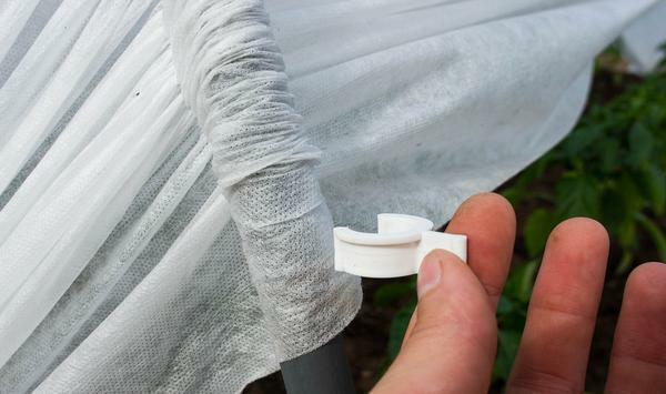 How to glue the film for the greenhouse: fix it on the arcs of the greenhouse, cover the fastening properly, tighten it as better
