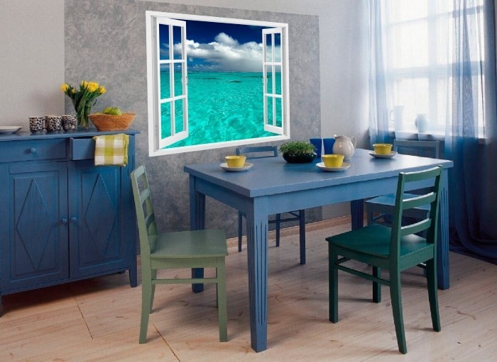 Mural in the kitchen window with a view of the sea