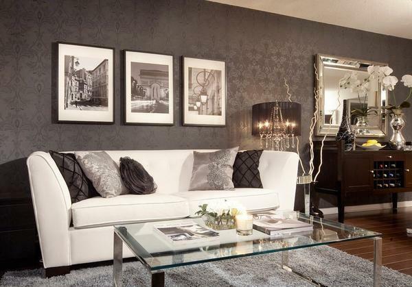 Usando papel de parede preto e branco, você deve escolher cuidadosamente o mobiliário, com especial atenção à sua cor, que revela todas as vantagens de decoração de interiores