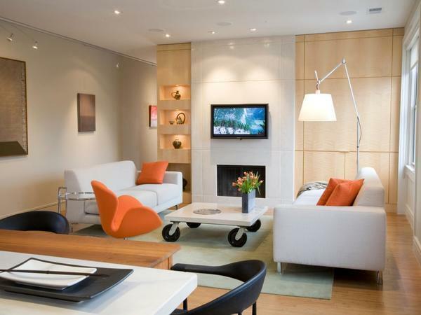 Good lighting will visually increase the small living room