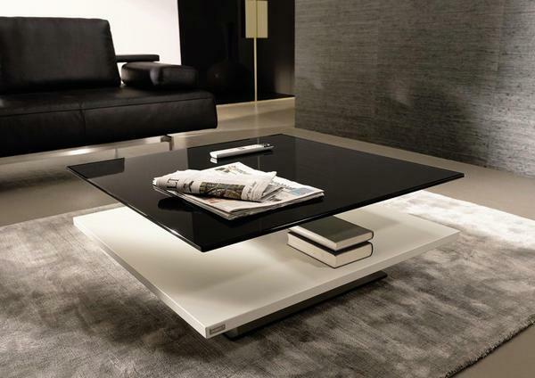 The coffee table in the living room should carry a certain functional load