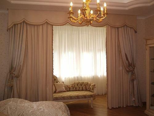 Curtains in the bedroom create a pleasant atmosphere of peace and tranquility