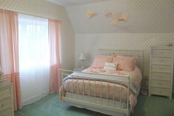 The interior of the bedroom in the attic with a sloped ceiling is often decorated in such a way as to create a twilight creating a relaxed and comfortable atmosphere for relaxation.