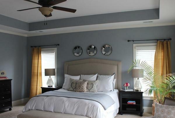 If the room is made in gray tones, thanks to the bright curtains, you can create a contrast