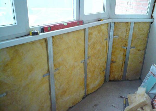 Mineral wool is inexpensive, and stacking it is quite simple