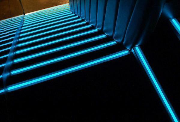 LED strip looks good on the stairs in the interior, made in the style of Art Nouveau or high-tech