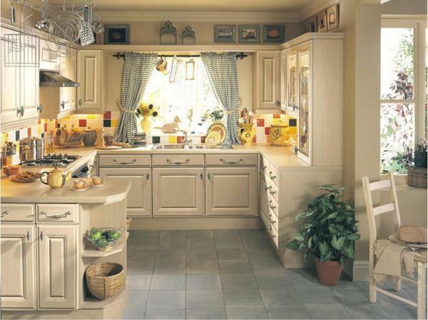 For kitchen in the style of Provence, you need to choose light colors of wallpaper