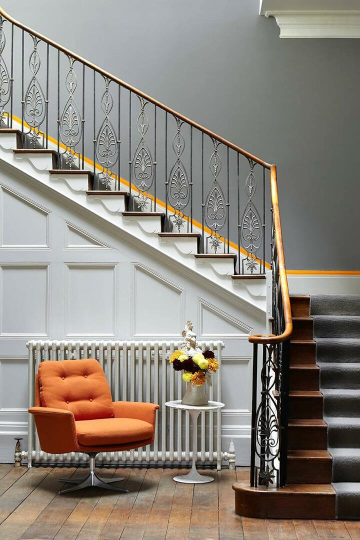 Forged stairs in the house on the second floor: a photo in the private on the porch