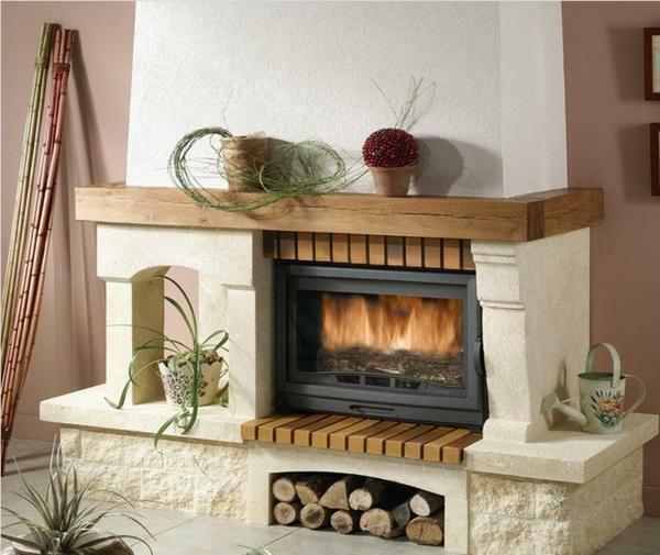 To select a design for a decorative fireplace should be so that it harmoniously complements the interior of the guest room