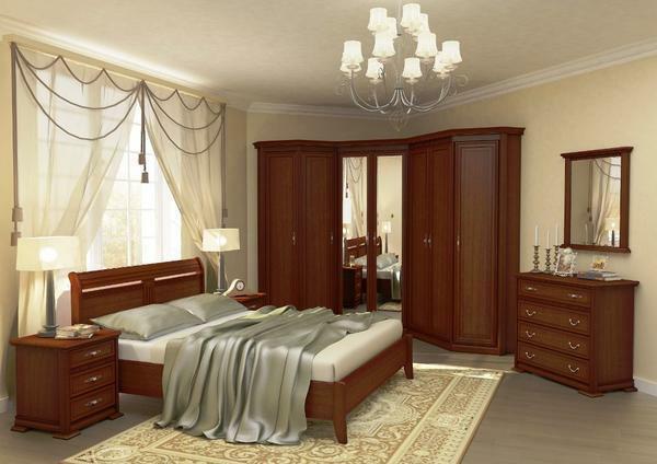 Quite often in the bedrooms in the classical style they use high quality wooden furniture