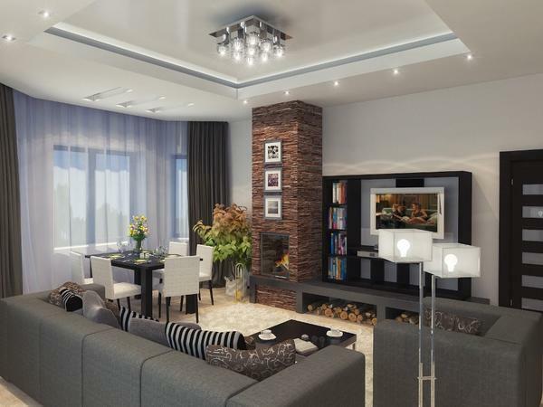 Stylishly complement the interior of the living room will help the fireplace, beautiful photos and unusual elements of decor