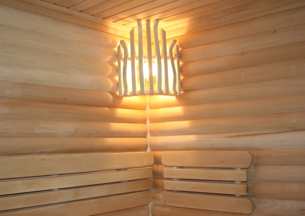 The lampshade is made of wood for lighting