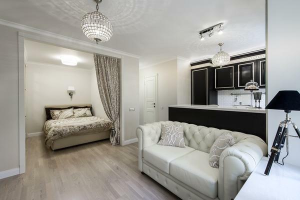 Quando si effettua una camera da letto, una zona soggiorno di 17 mq.m è meglio usare colori chiari, che aumentano visivamente la stanza