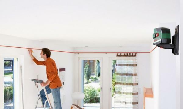 The marking of the base ceiling is made using a laser level
