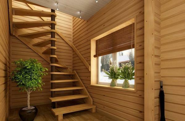 It is recommended to cover a wooden staircase in the dacha with a layer of varnish