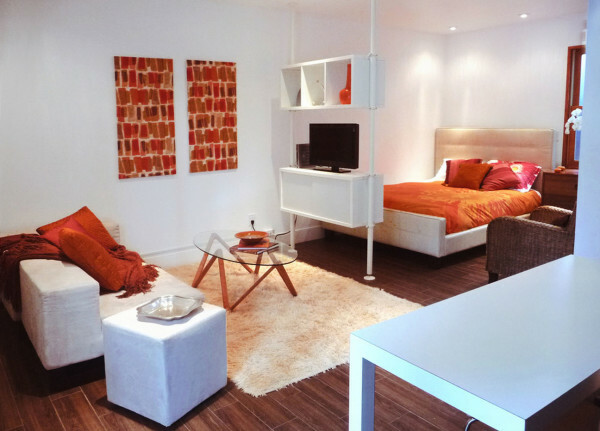 Photo living room-bedroom apartment in a high-rise building