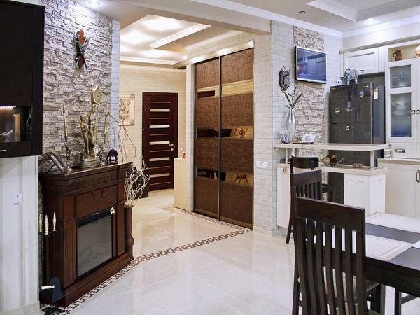 When combining the kitchen with the hallway, it is better to apply those materials that can be easily washed and cleaned