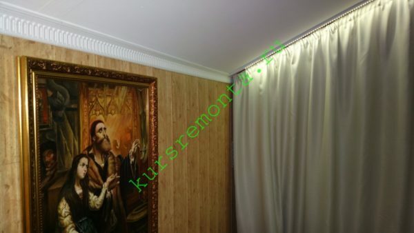 Plywood side walls are decorated with paneling made of MDF.