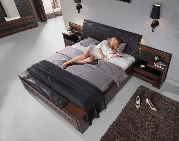 For a bedroom in a private house, it is necessary to choose the most compact objects of a furniture set, for example bedside tables, connected to the bed base