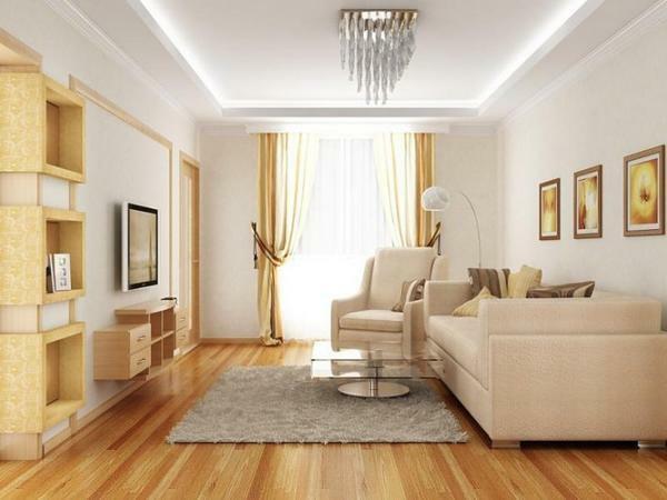 The usual living room, decorated with hanging ceilings and parquet, will look very presentable and luxurious