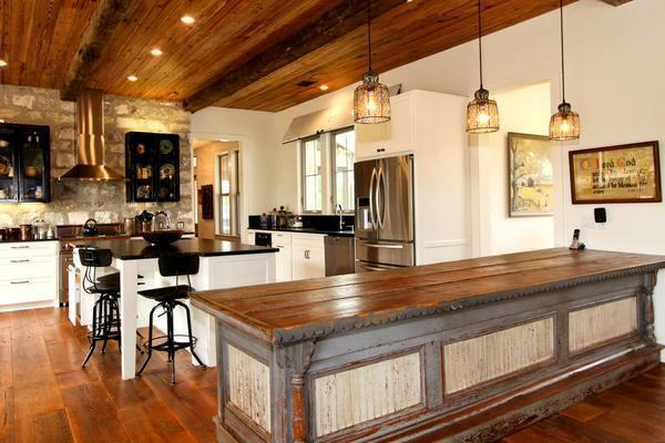 For finishing the ceiling in the kitchen, beams made of polyurethane are excellent, as they are light and moisture resistant