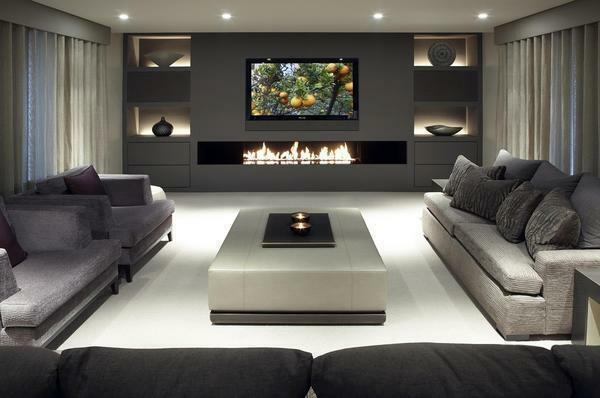 The original idea is the location of a long electric fireplace in the living room, made in the Art Nouveau style or high-tech