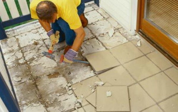 Removing the old tiles - the work tedious