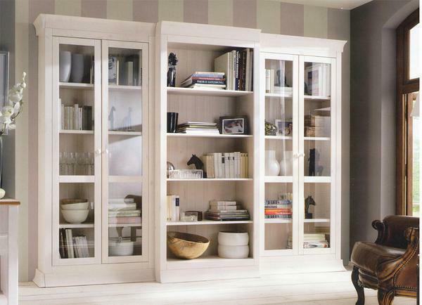 Cupboard with glass in the living room: inexpensive with photo, corner glass furniture, pencil case in the book room