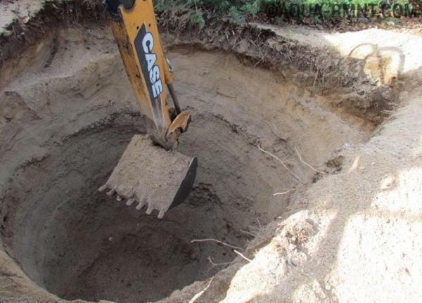 Pit para anéis de concreto é melhor para cavar com uma escavadeira