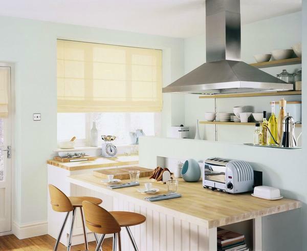 Many people prefer to choose stylish curtains in the kitchen, because they are easy to care for