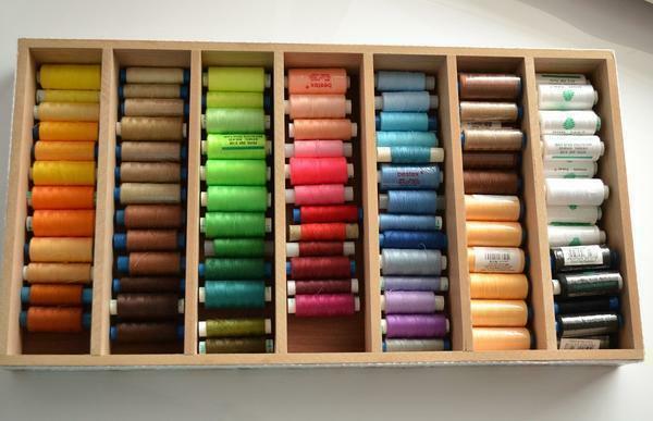 For the storage of threads, an excellent option is to use a special box with many compartments