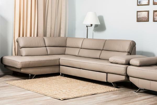 A modern corner sofa perfectly fits both in the living room, and the kitchen or even the bedroom