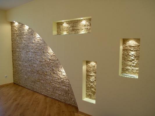 Beautiful plasterboard wall is able to decorate the interior of the living room