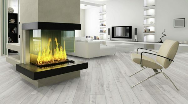 Laminate flooring in interior design: the photo shows how convincing can be an imitation plank floor.