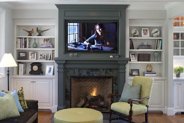 To date, it is very original to put the TV above the fireplace