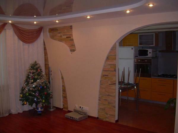 Como um acabamento paredes de gesso podem ser usados ​​belo papel de parede ou gesso decorativo