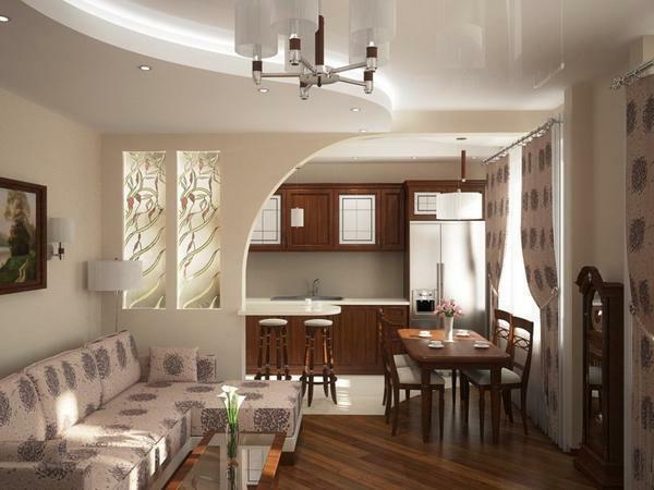 The combination of the kitchen and the living room is carried out using a combination of different rooms allocated with the help of a variety of architectural elements: columns or figured arches