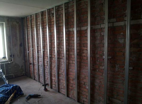 Wall of brick or plasterboard: glue and fix, cover the foam block, concrete with a sheet, installation technology