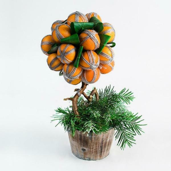 Want to decorate the room with a symbol of cheerfulness, then an excellent option will be a mandarin tree