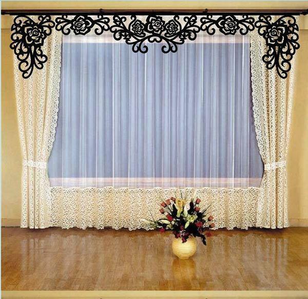 Openwork curtains perfectly fit into the interior of almost any living room