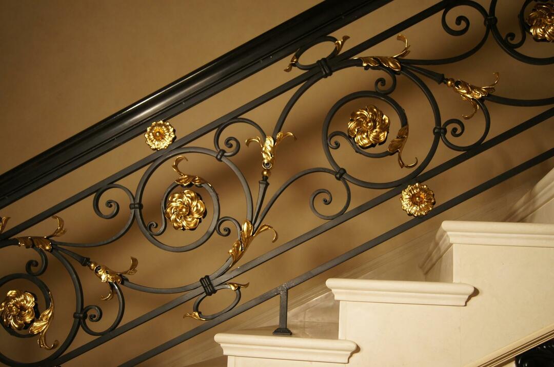 Forged railing for stairs: photos of forging and wooden stairs, artistic sketches and designs in the house and on the street