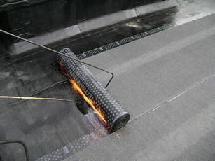The burner softens the lower material layer, it is securely adhered to the substrate