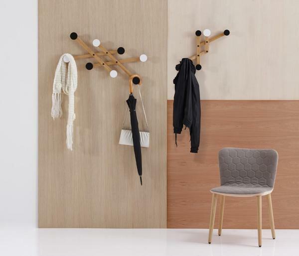 Wall-mounted wooden hanger in a small hallway will be an equivalent replacement of the cabinet