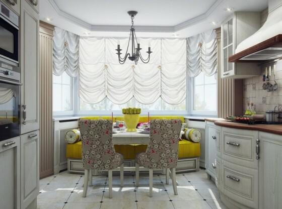 An example of a successful kitchen design studio: in the bay window seating area and a combined dining group