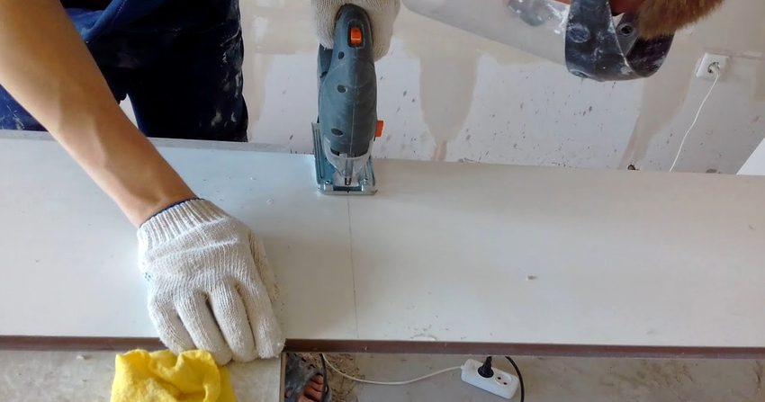 You can cut a plastic window sill with both a jigsaw and a grinder